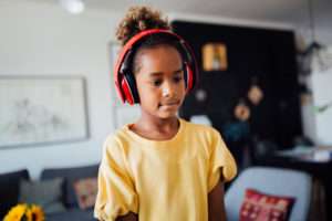 young student with headphones